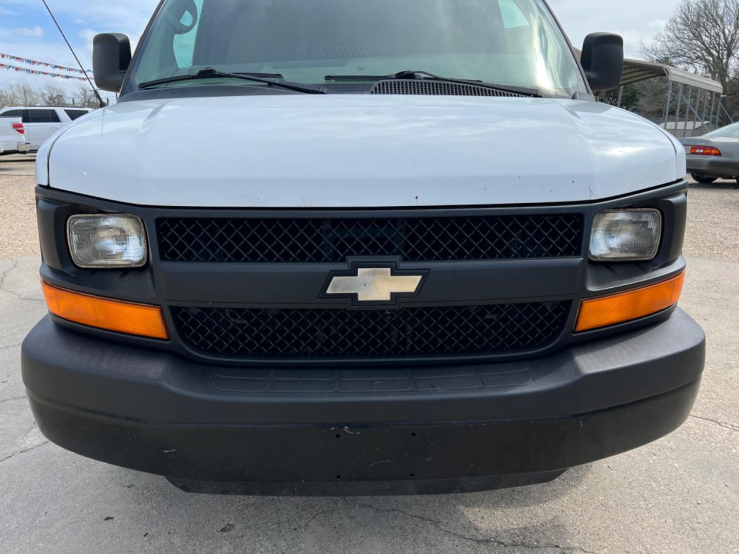 2013 White /Gray Chevrolet Express (1GCWGFCA0D1) with an 4.8 V8 engine, Automatic transmission, located at 4520 Airline Hwy, Baton Rouge, LA, 70805, (225) 357-1497, 30.509325, -91.145432 - 2013 Chevy Express 2500 Cargo Van 4.8 V8 Gas, 250K Miles, Power Windows & Locks. NO IN HOUSE FINANCING. FOR INFO PLEASE CONTACT JEFF AT 225 357-1497 CHECK OUT OUR A+ RATING WITH THE BETTER BUSINESS BUREAU WE HAVE BEEN A FAMILY OWNED AND OPERATED BUSINESS AT THE SAME LOCATION FOR OVER 45 YEARS. WE S - Photo#2